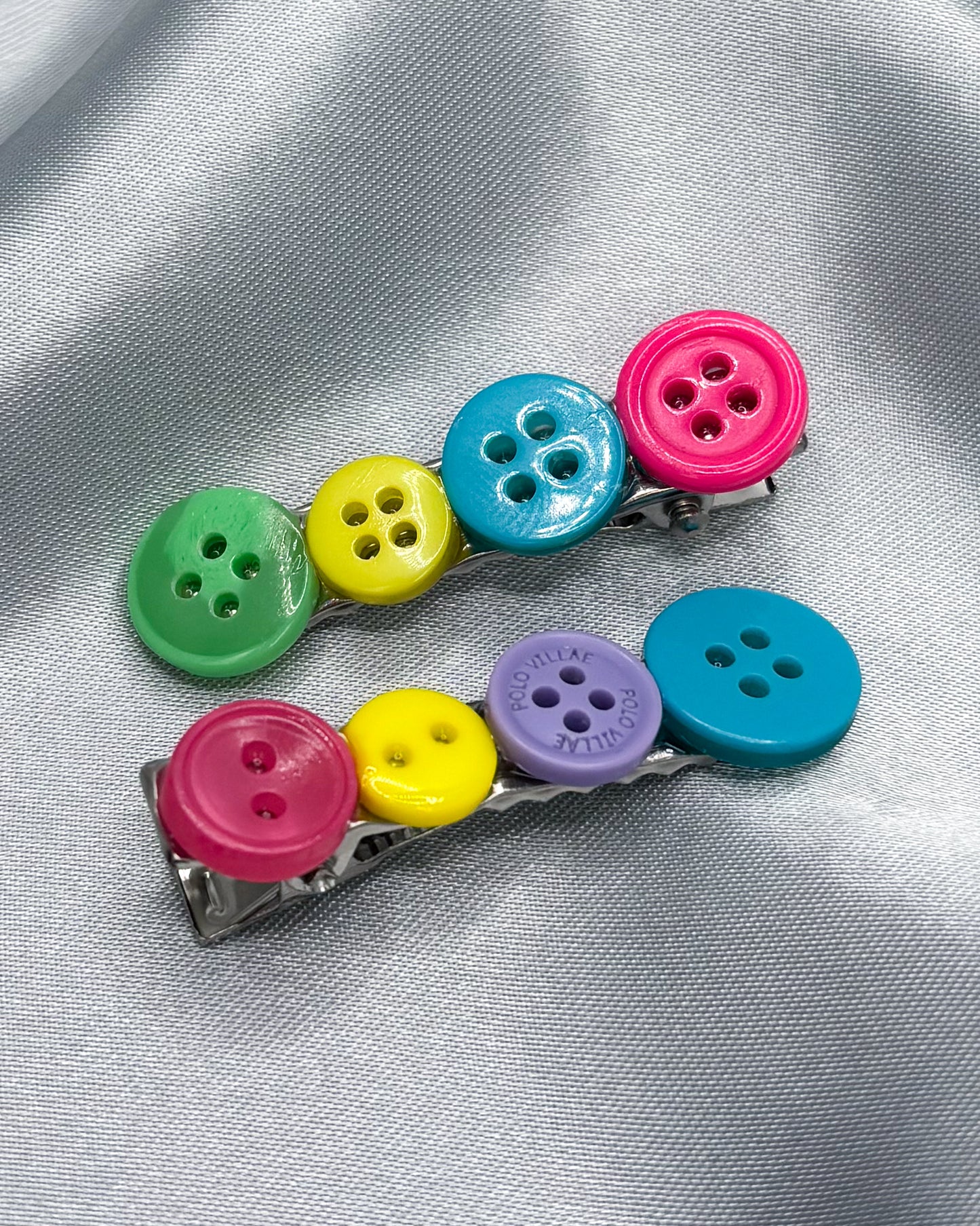 PRISMATIC BUTTON HAIR CLIPS