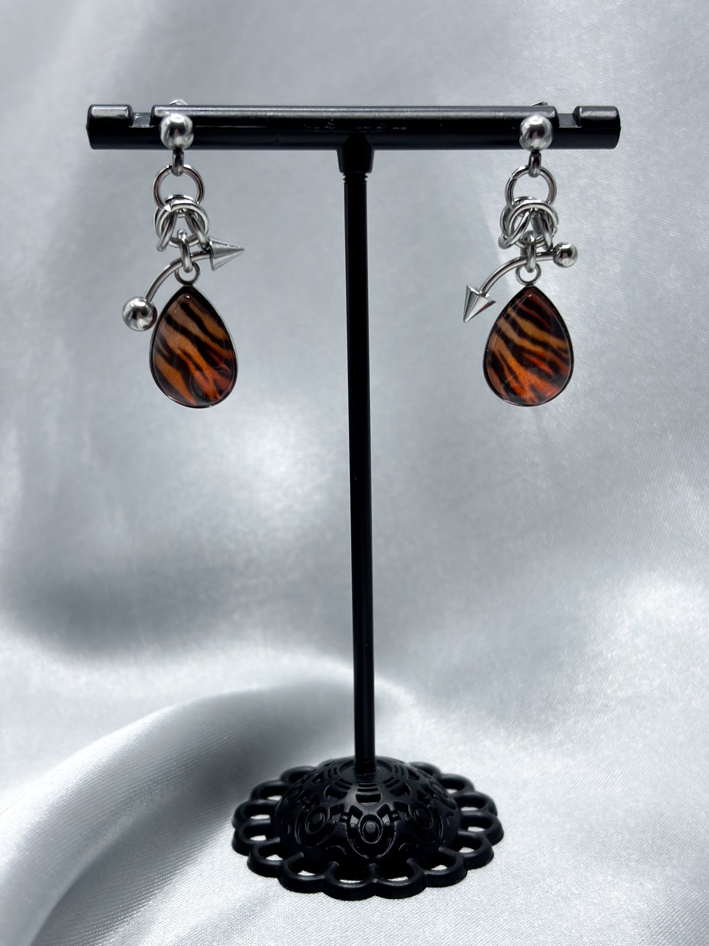 PIERCED OVAL TIGER EARRINGS
