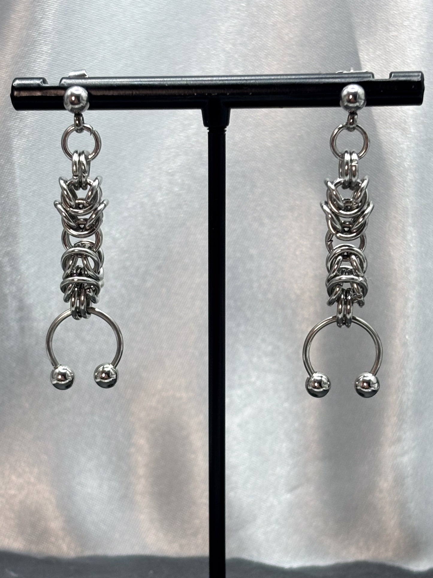 PIERCED HORSESHOE EARRINGS