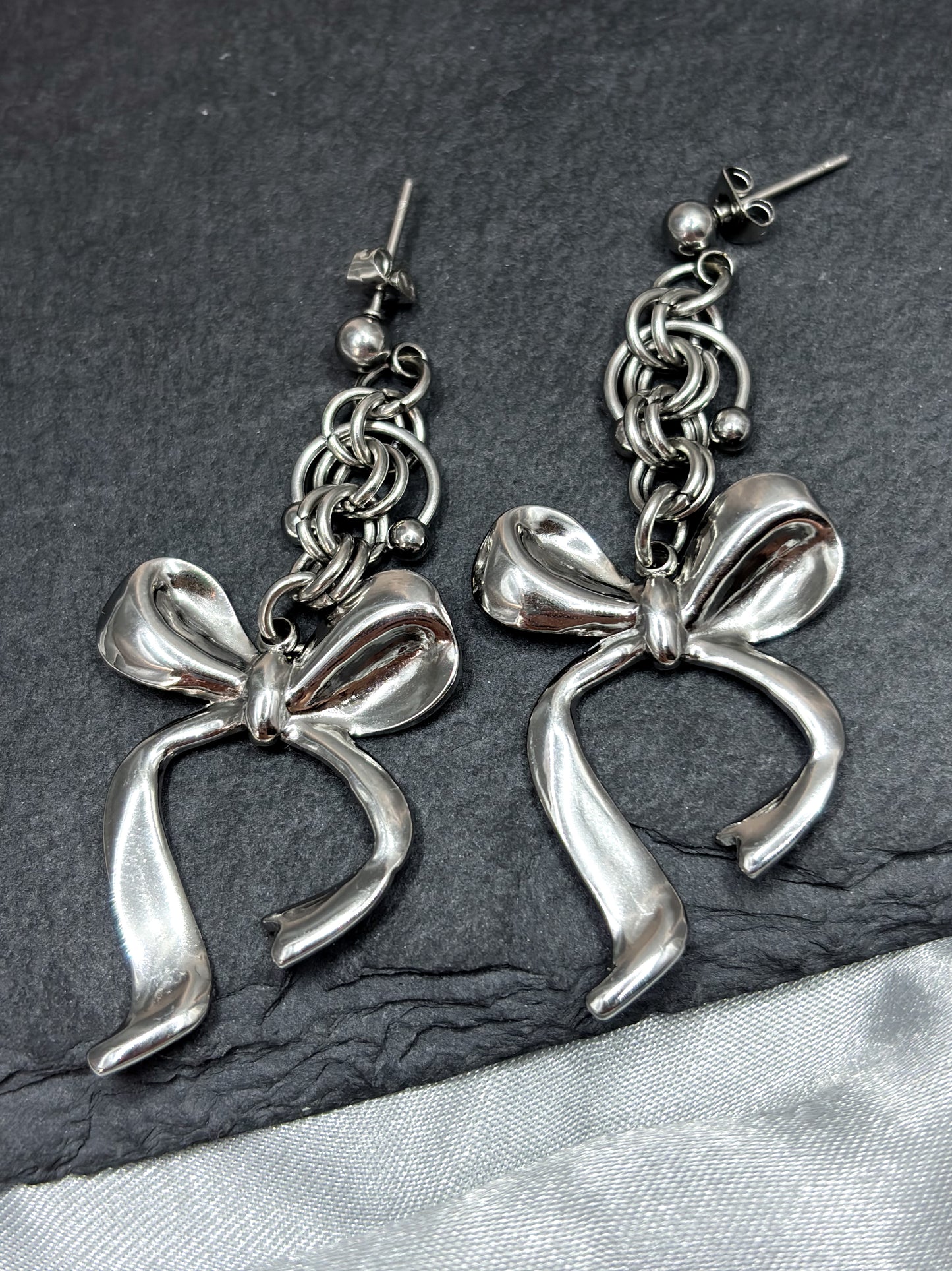 SILVER BOW EARRINGS