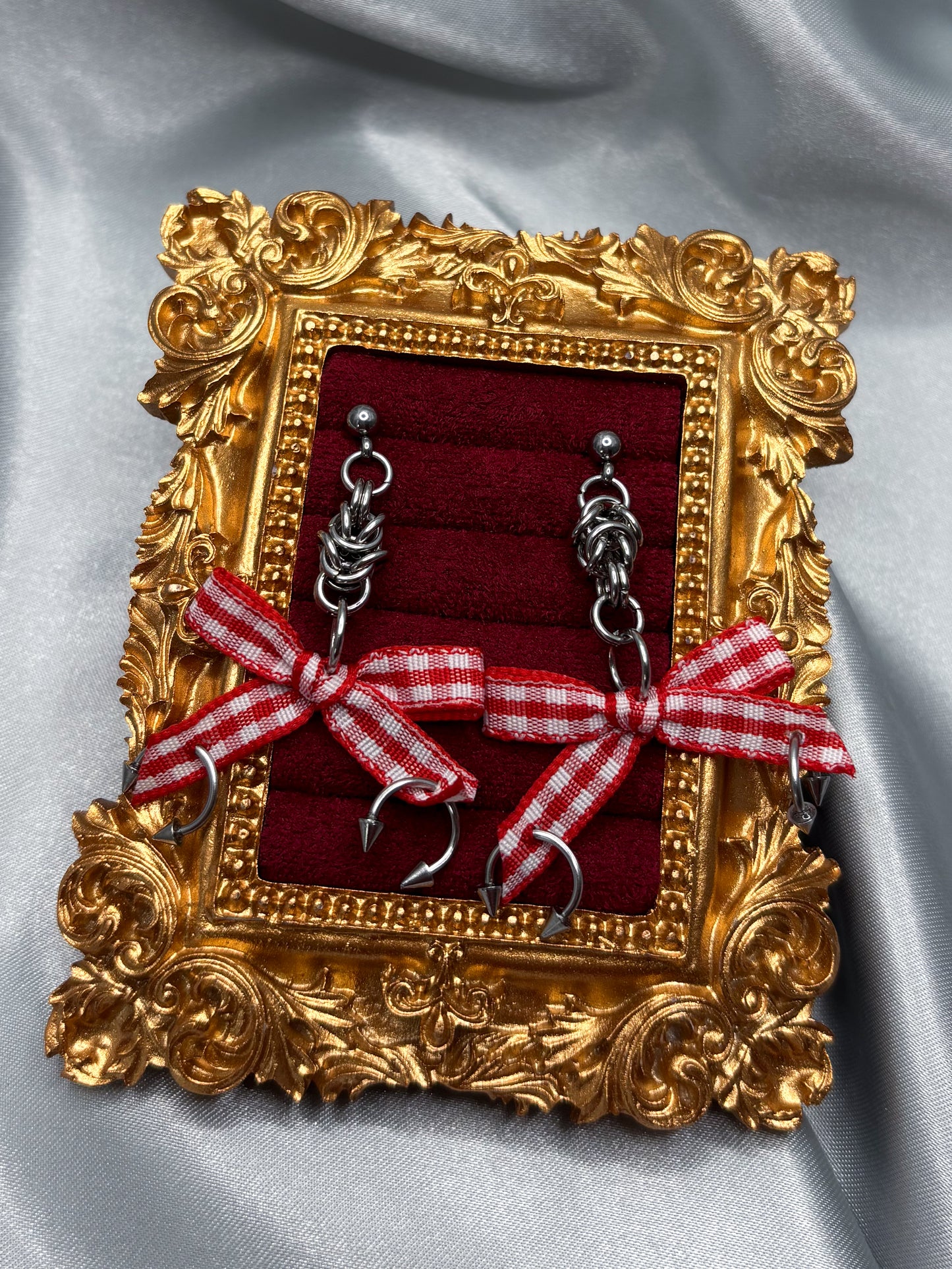 PIERCED BOW EARRINGS