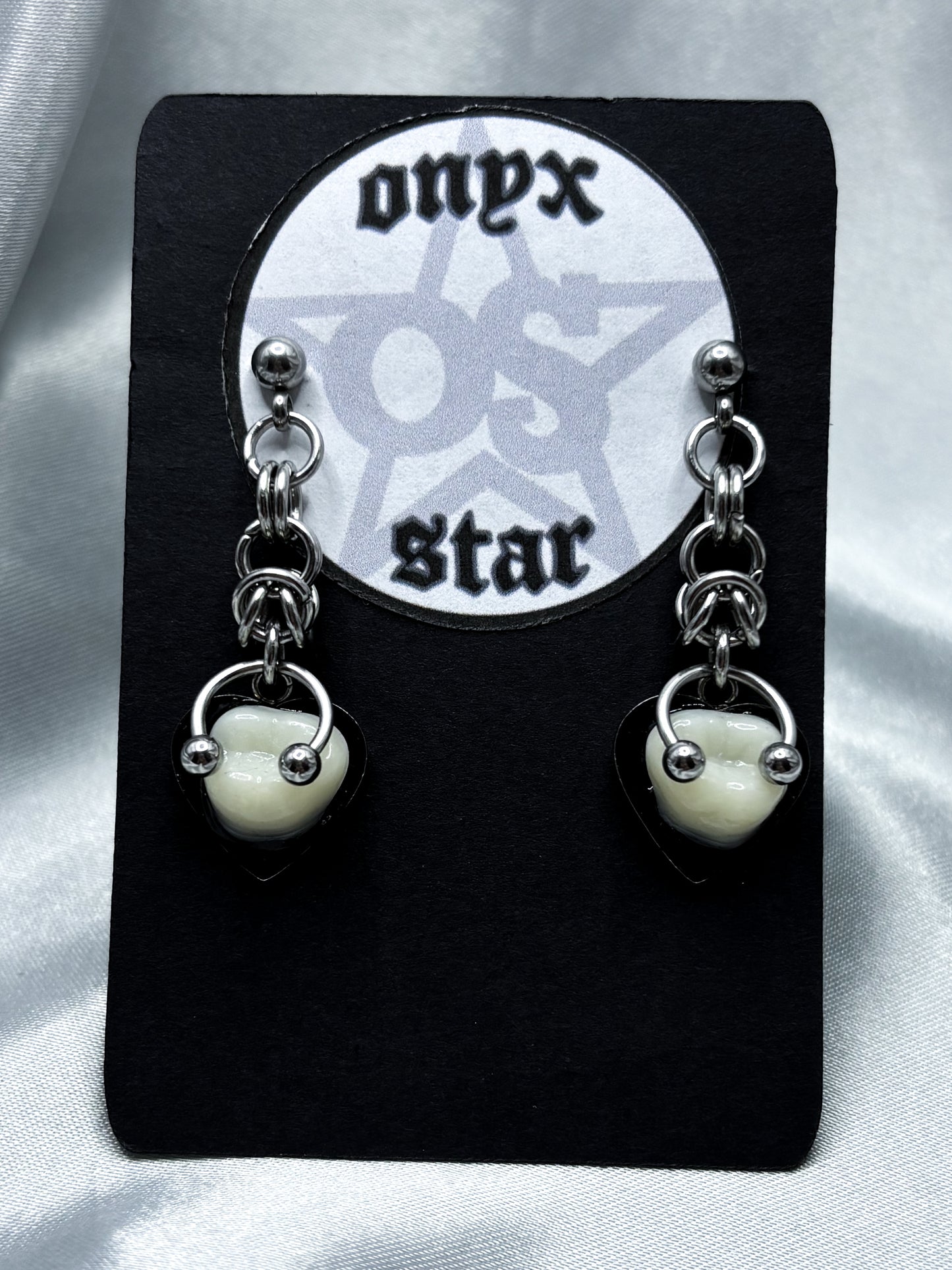 PIERCED HEART TOOTH EARRINGS