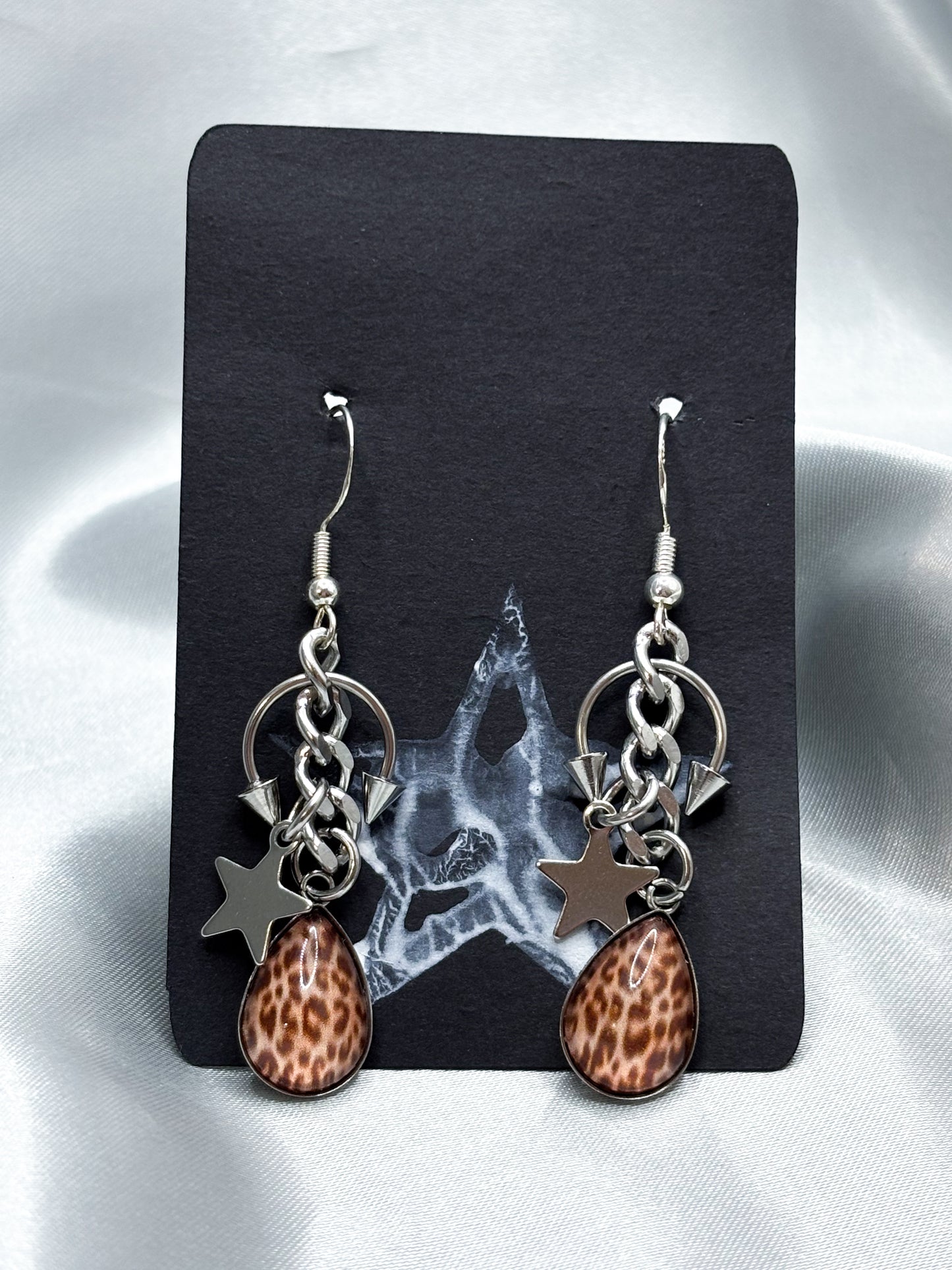 PIERCED LEO EARRINGS
