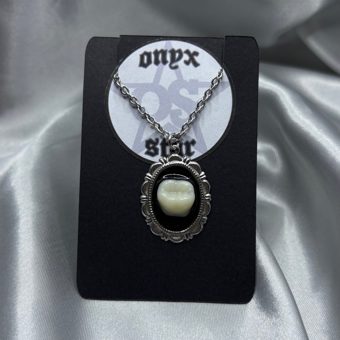 ECLIPSE TOOTH NECKLACE
