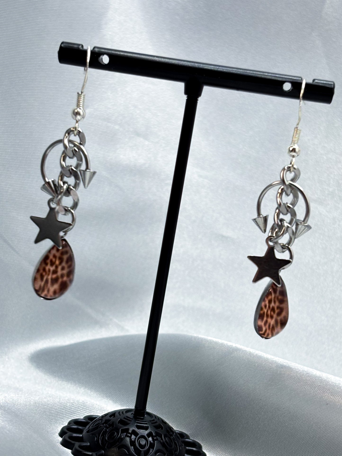 PIERCED LEO EARRINGS
