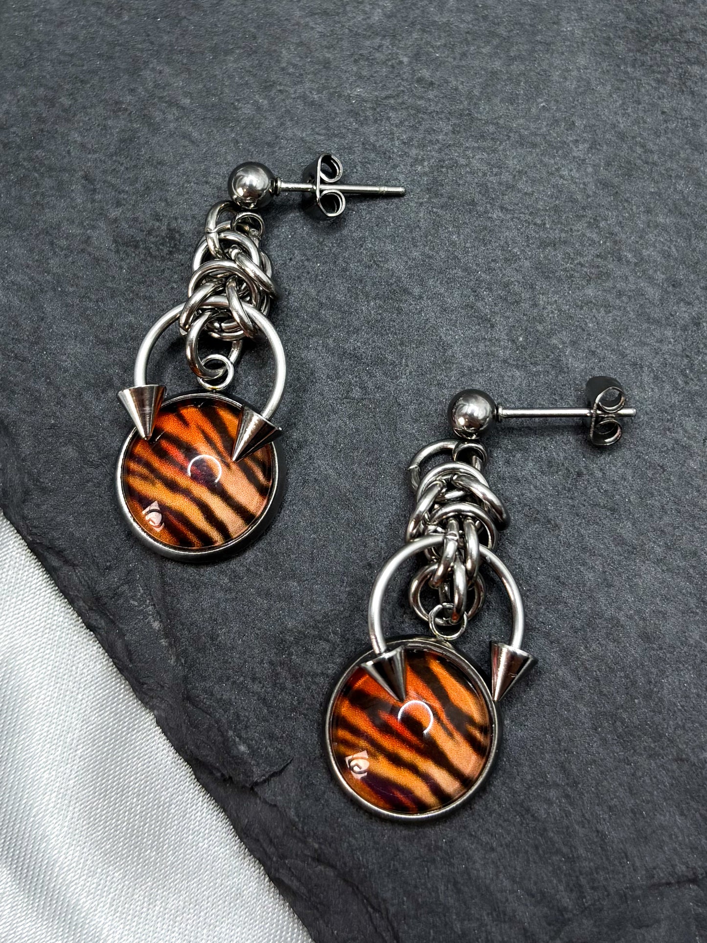 PIERCED TIGER EARRINGS