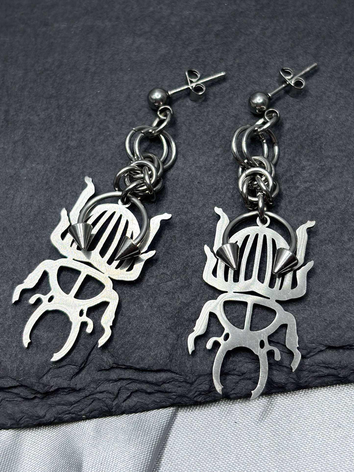 PIERCED BEETLE EARRINGS