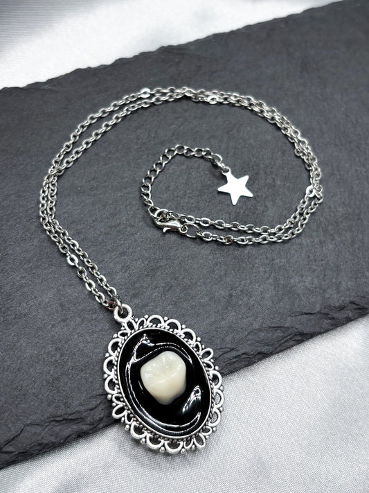 ECLIPSE TOOTH NECKLACE