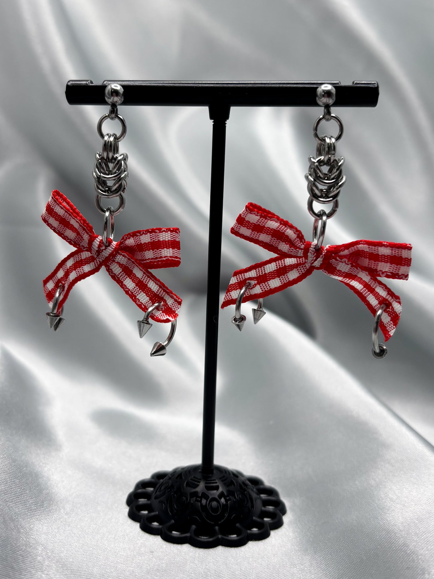 PIERCED BOW EARRINGS