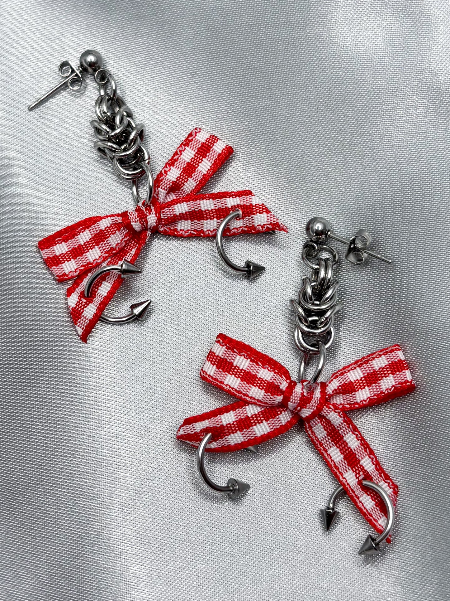 PIERCED BOW EARRINGS