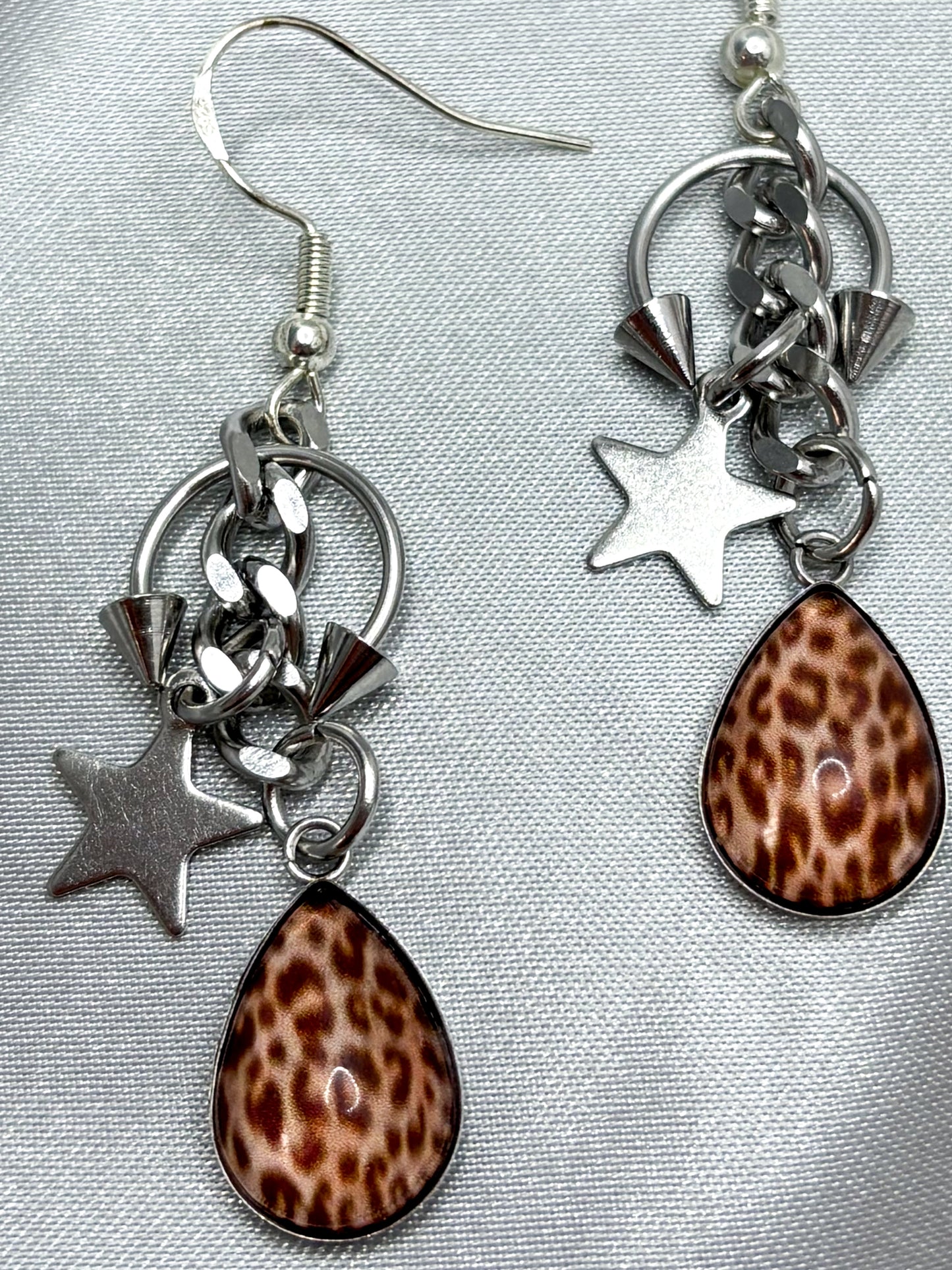 PIERCED LEO EARRINGS