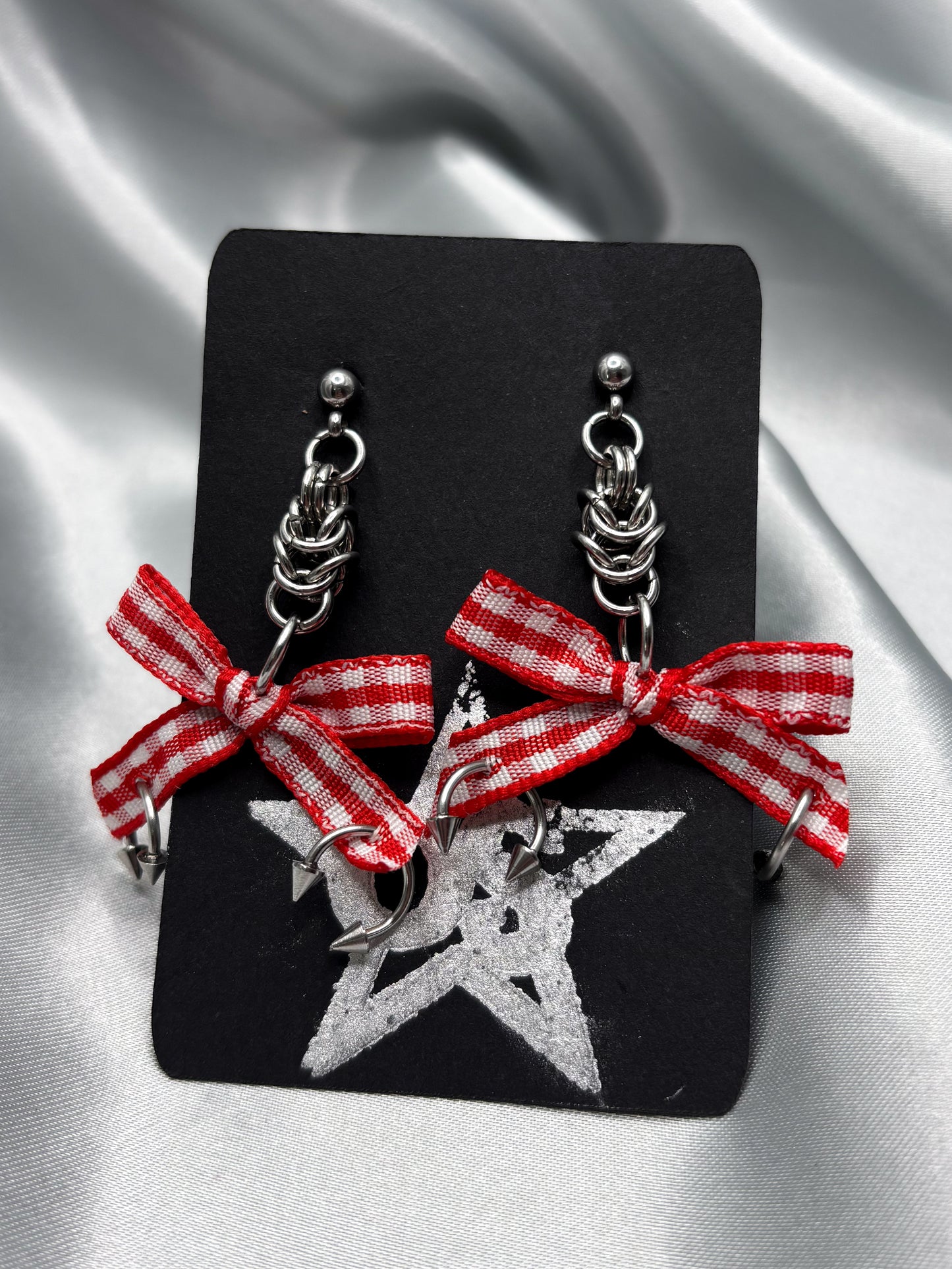 PIERCED BOW EARRINGS