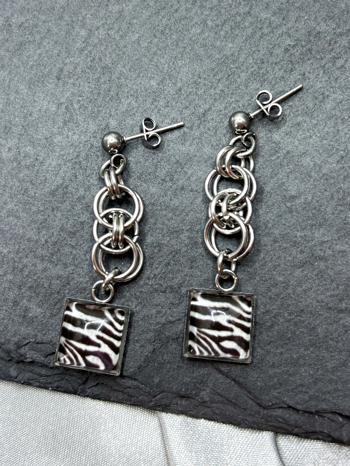 CHAINED ZEBRA EARRINGS