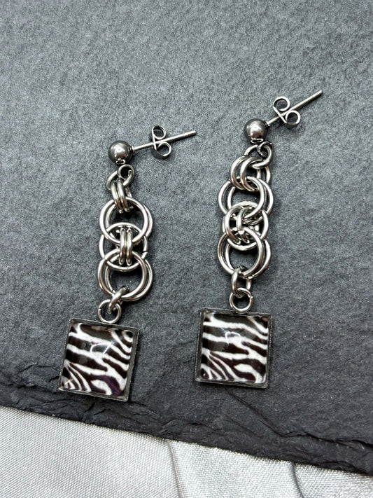 CHAINED ZEBRA EARRINGS