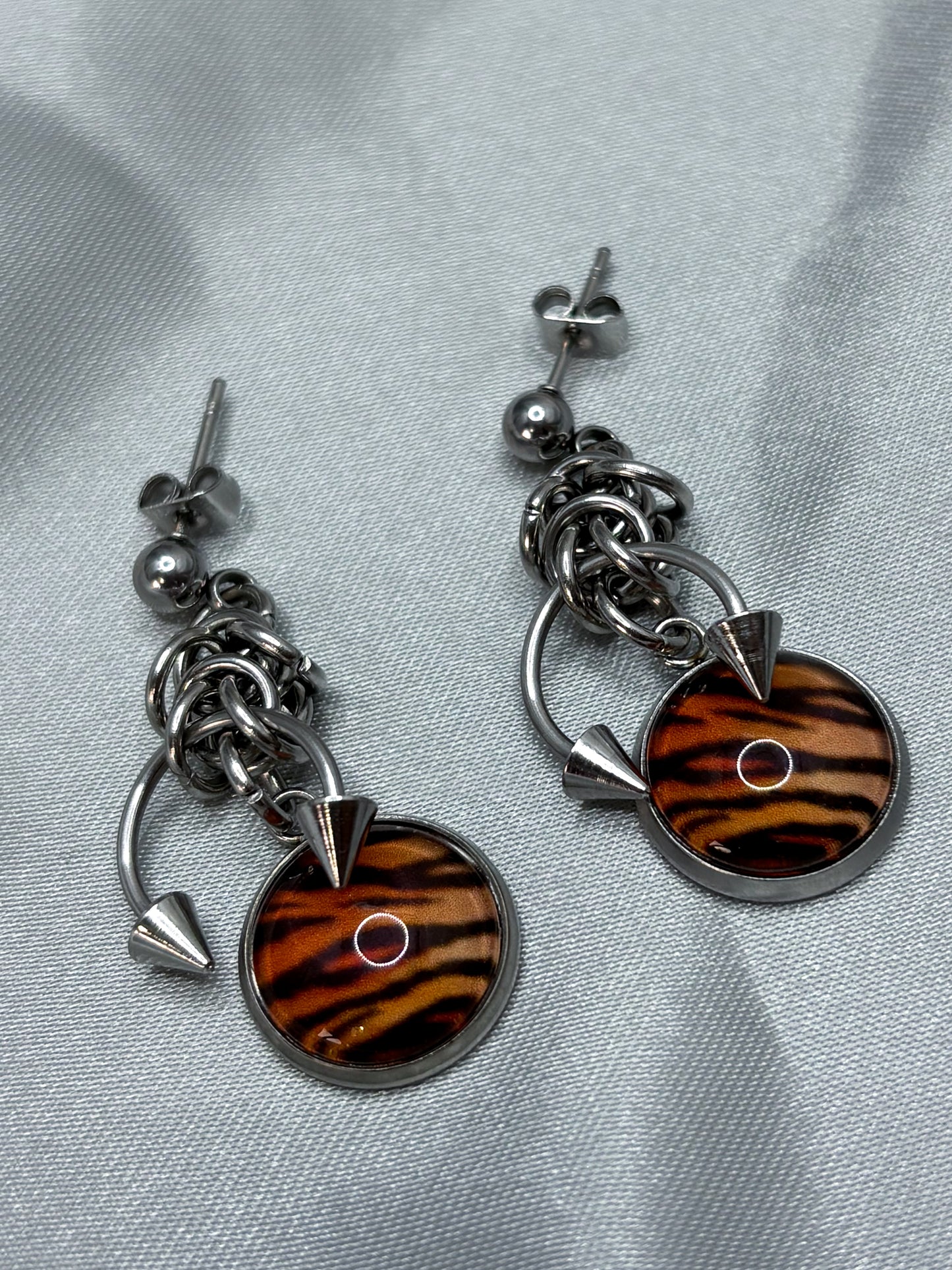 PIERCED TIGER EARRINGS