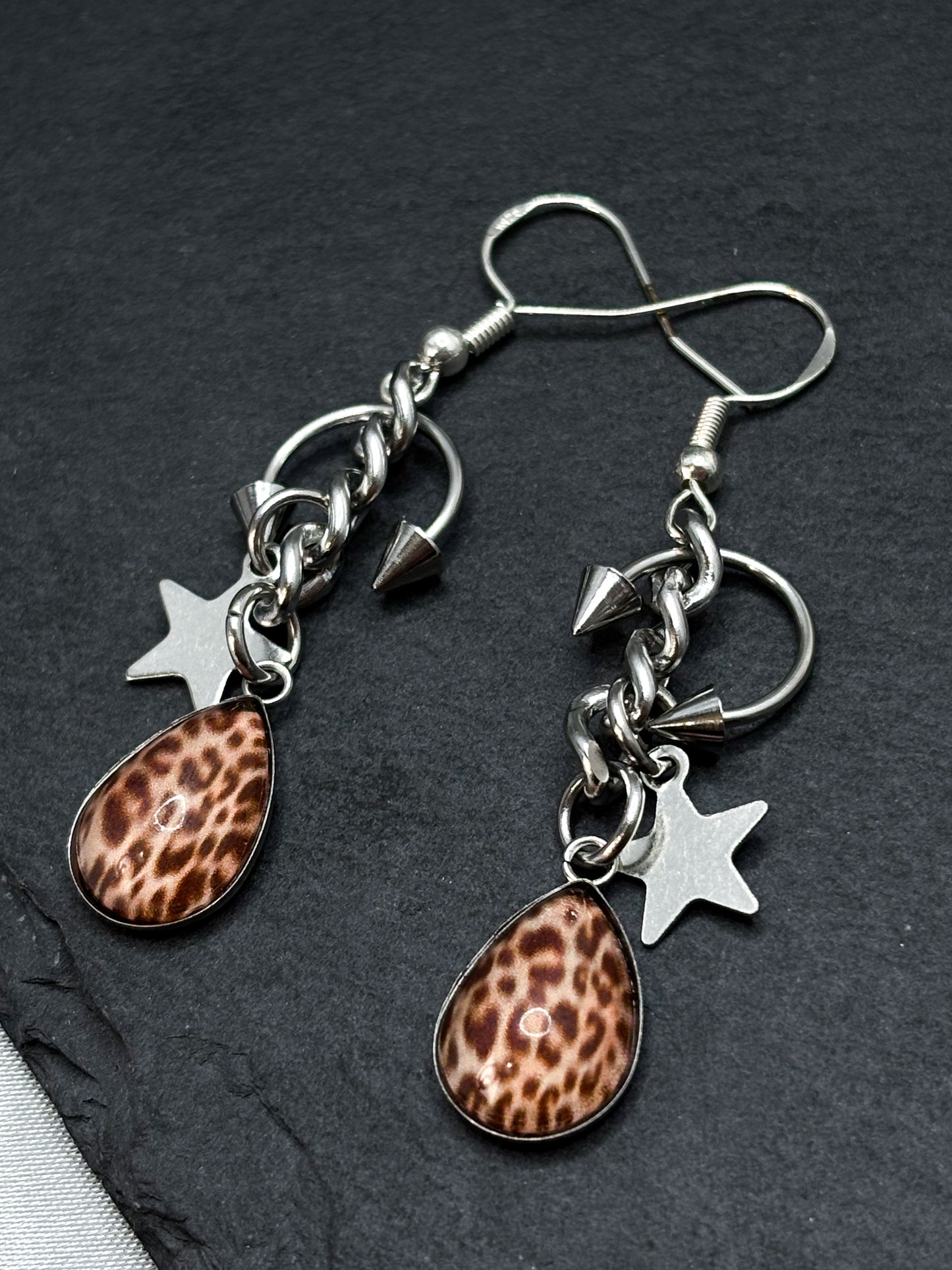 PIERCED LEO EARRINGS