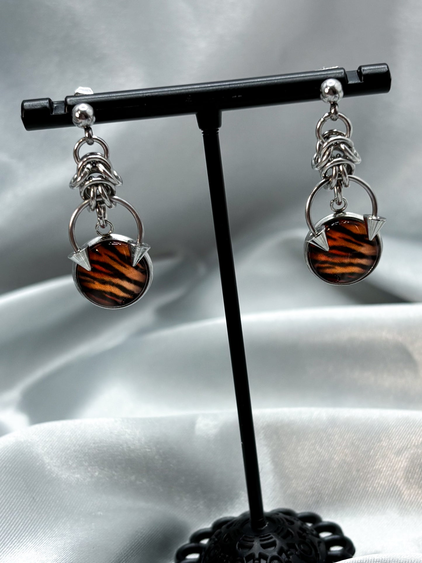 PIERCED TIGER EARRINGS