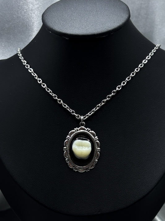 ECLIPSE TOOTH NECKLACE