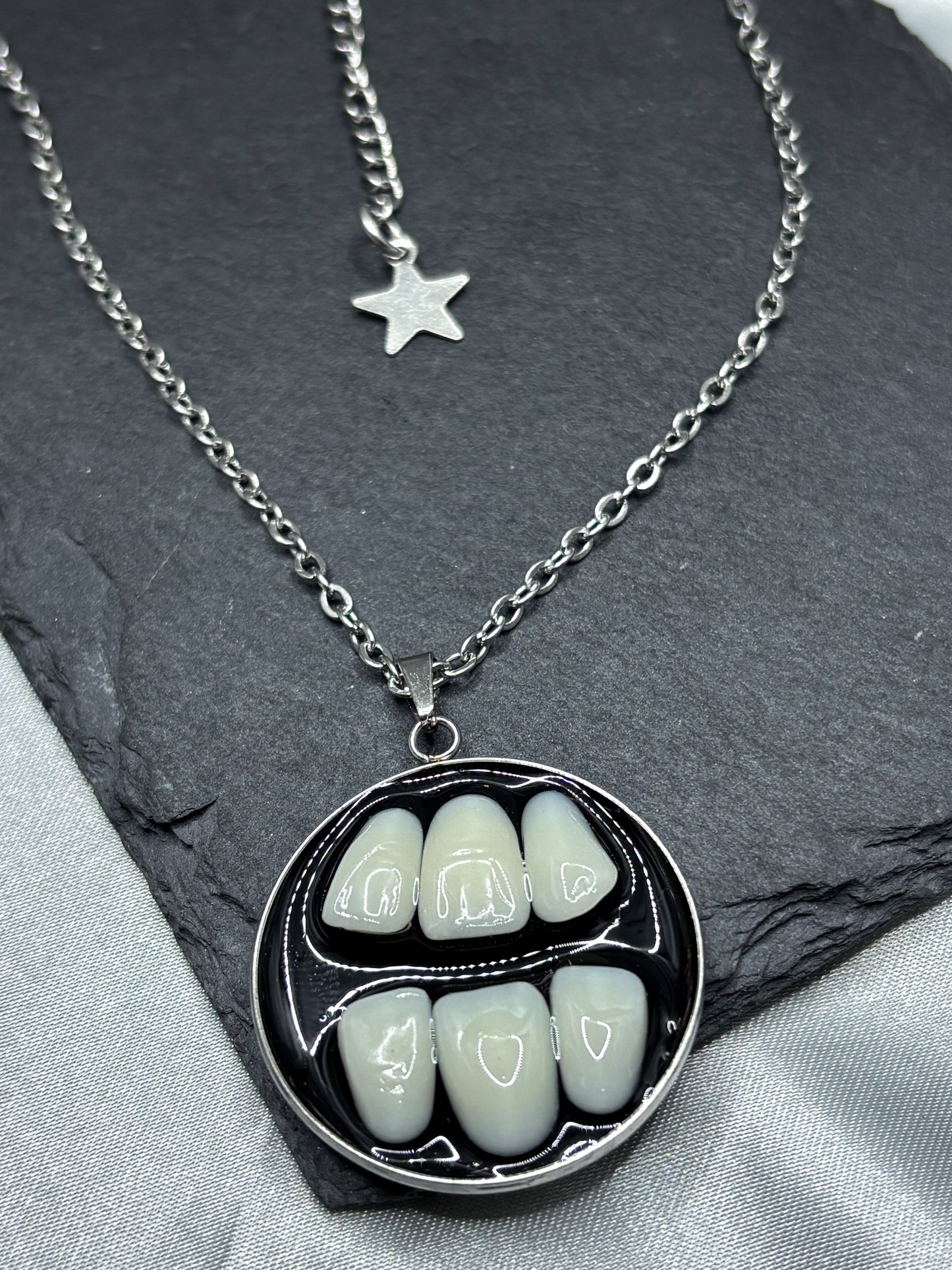 GRINDING TEETH NECKLACE