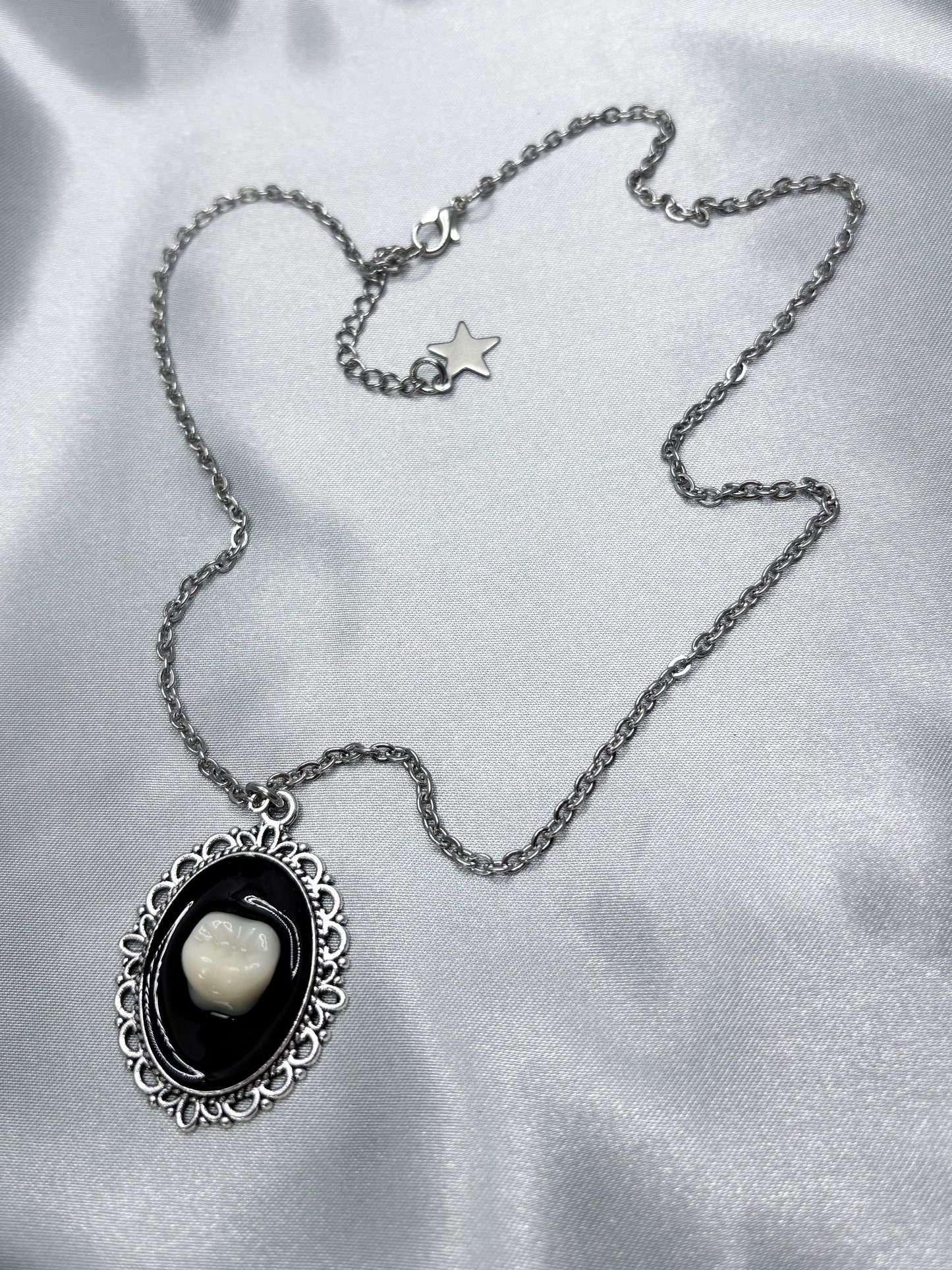 ECLIPSE TOOTH NECKLACE
