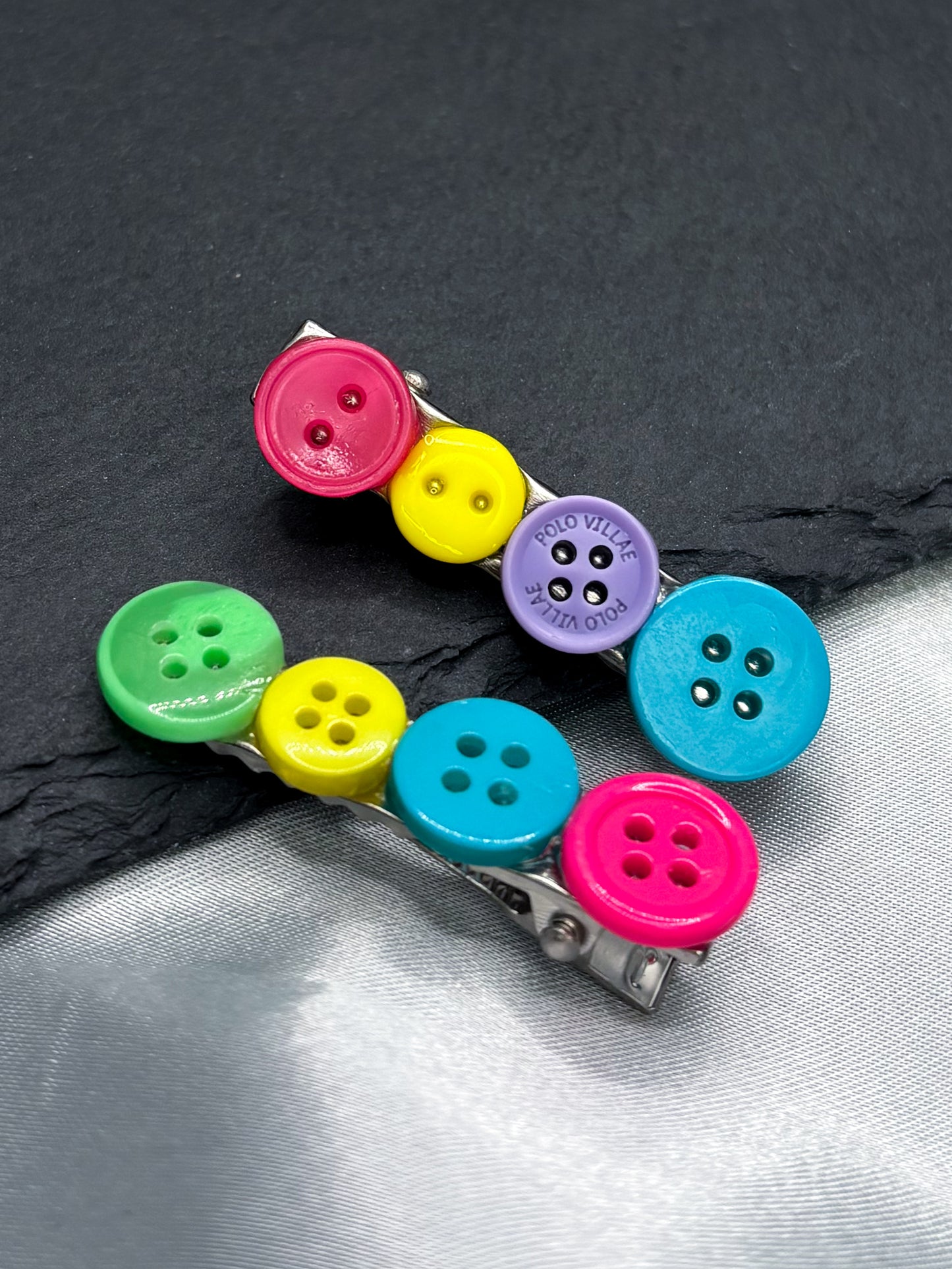 PRISMATIC BUTTON HAIR CLIPS