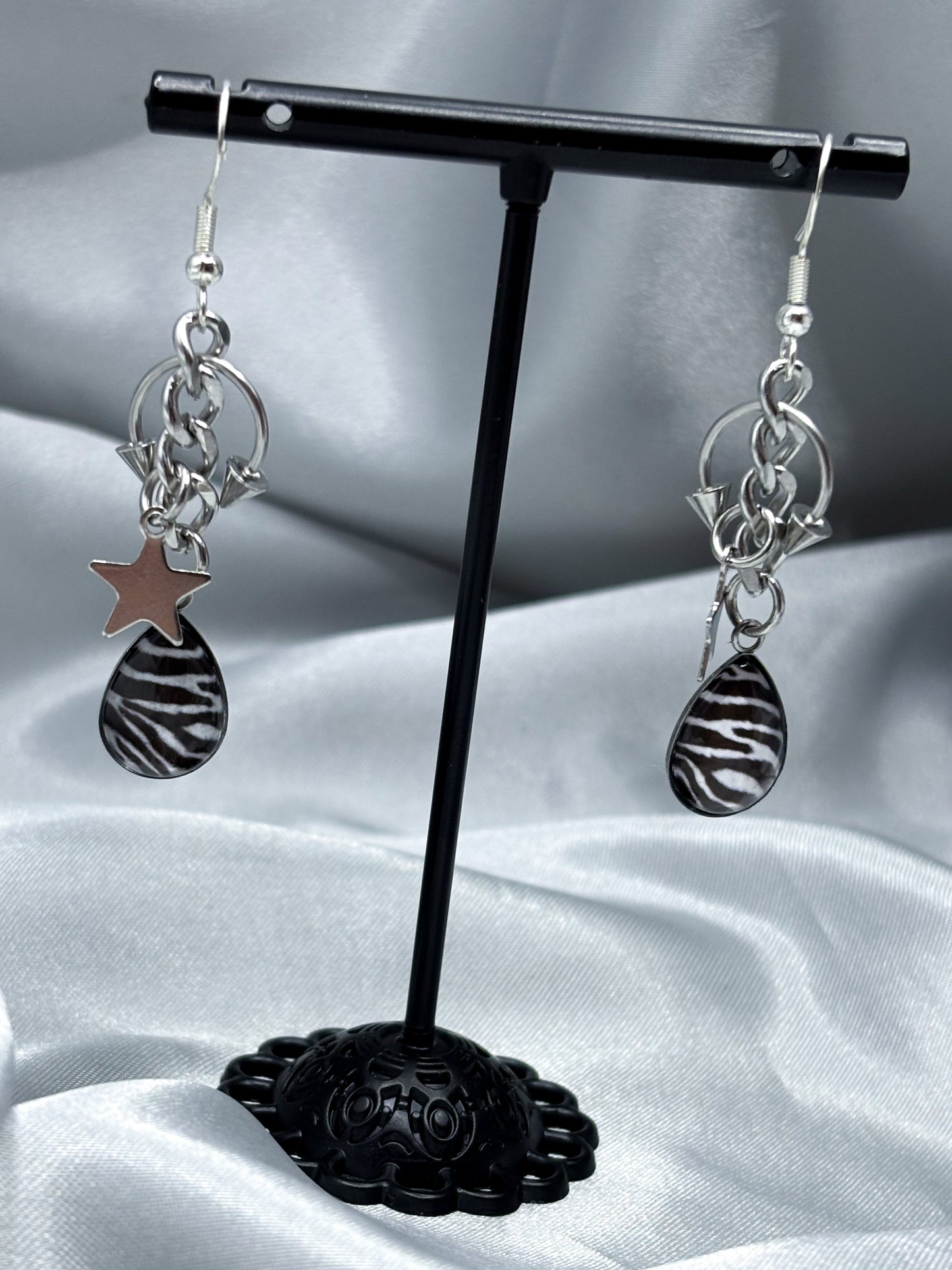 PIERCED ZEBRA EARRINGS