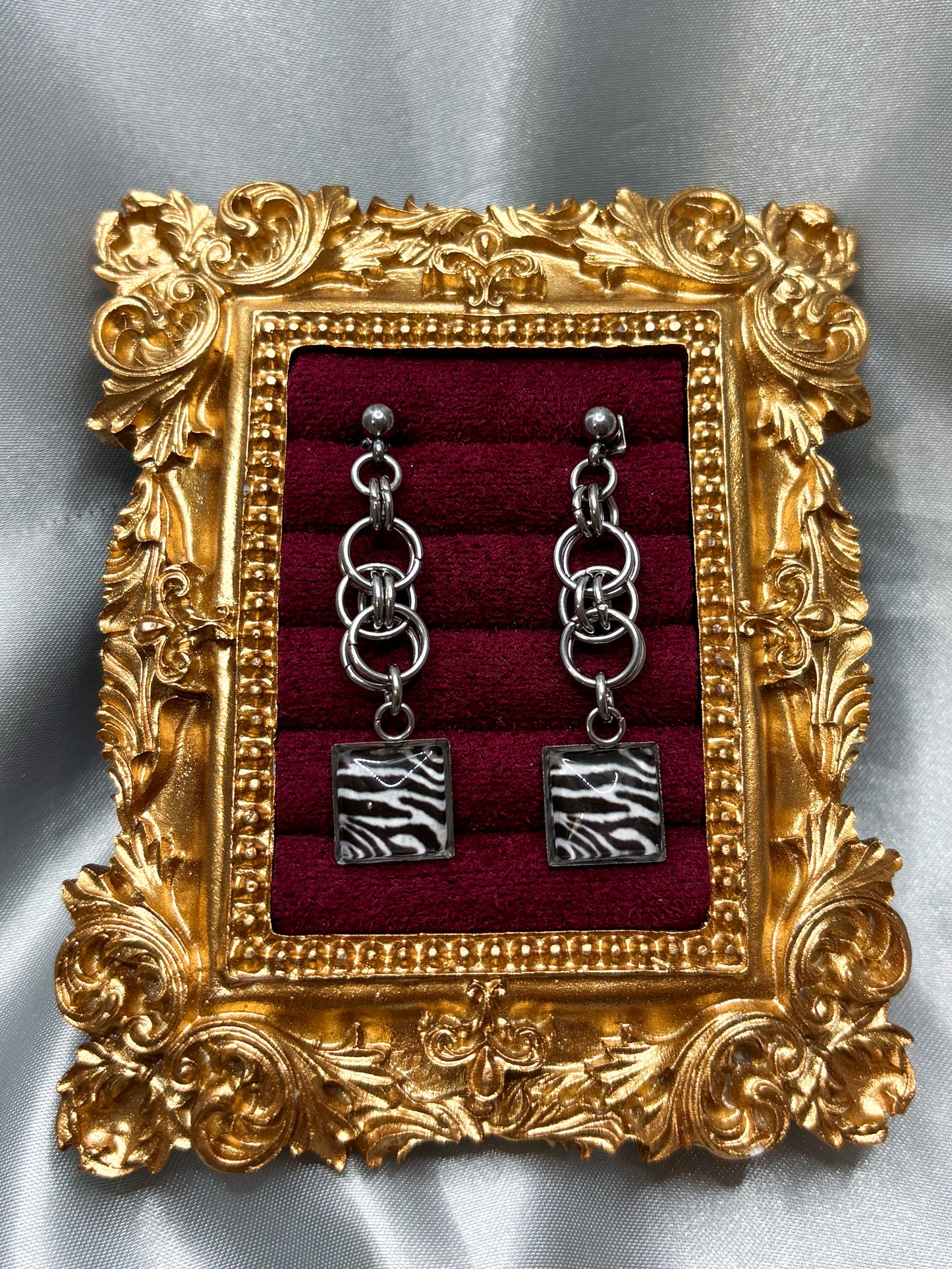 CHAINED ZEBRA EARRINGS
