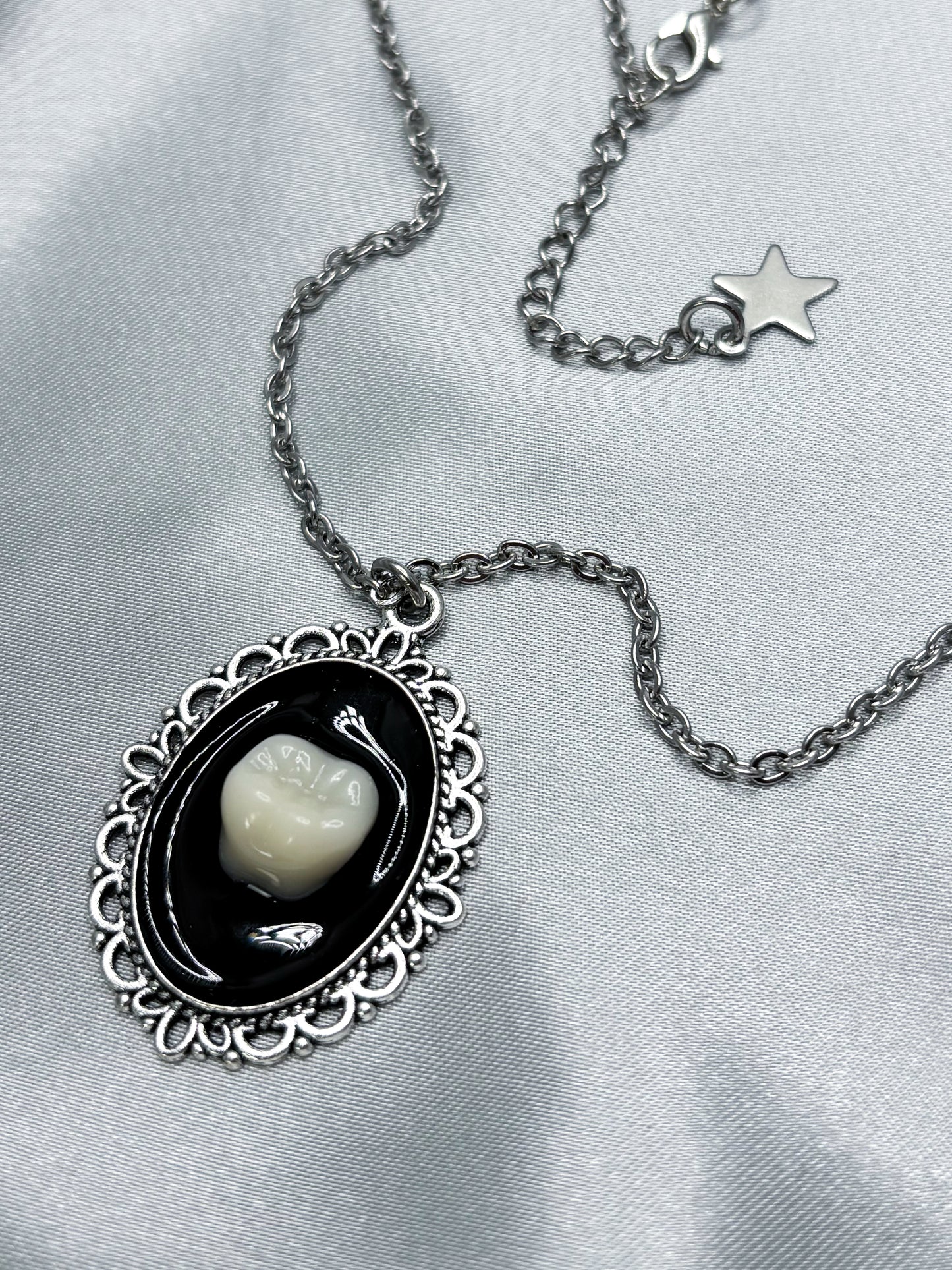 ECLIPSE TOOTH NECKLACE