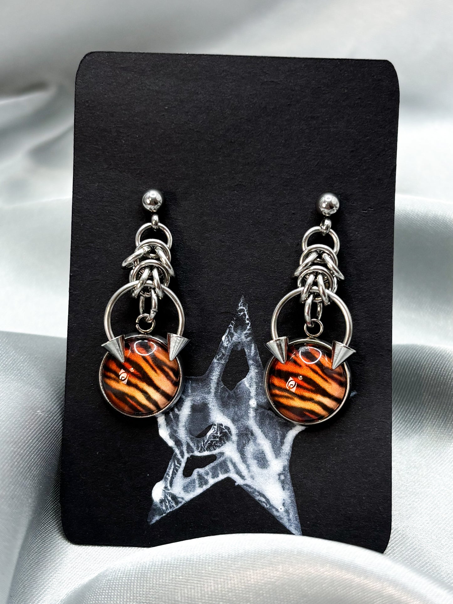 PIERCED TIGER EARRINGS