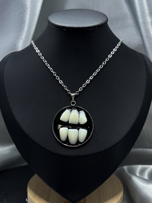 GRINDING TEETH NECKLACE