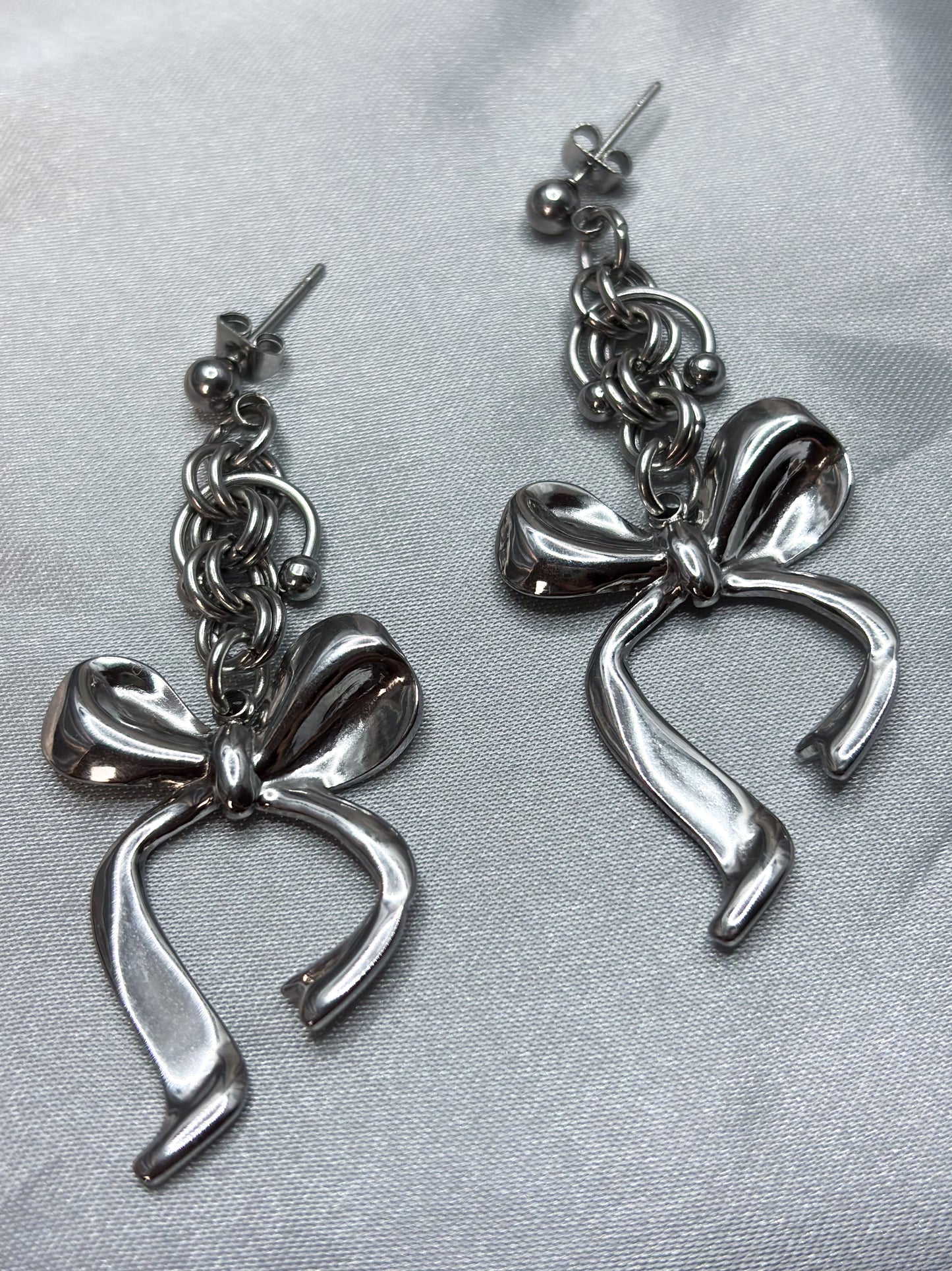 SILVER BOW EARRINGS