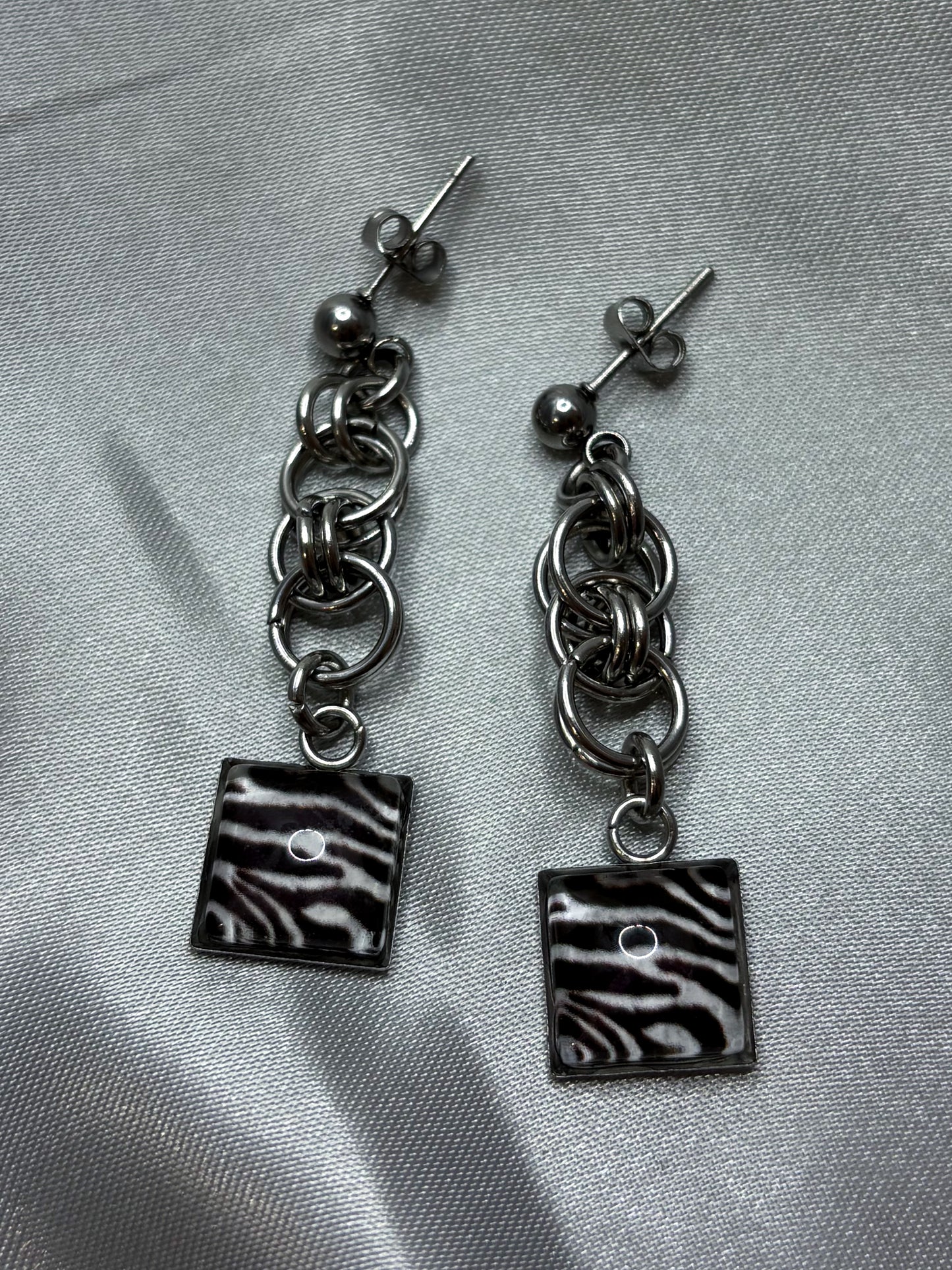 CHAINED ZEBRA EARRINGS