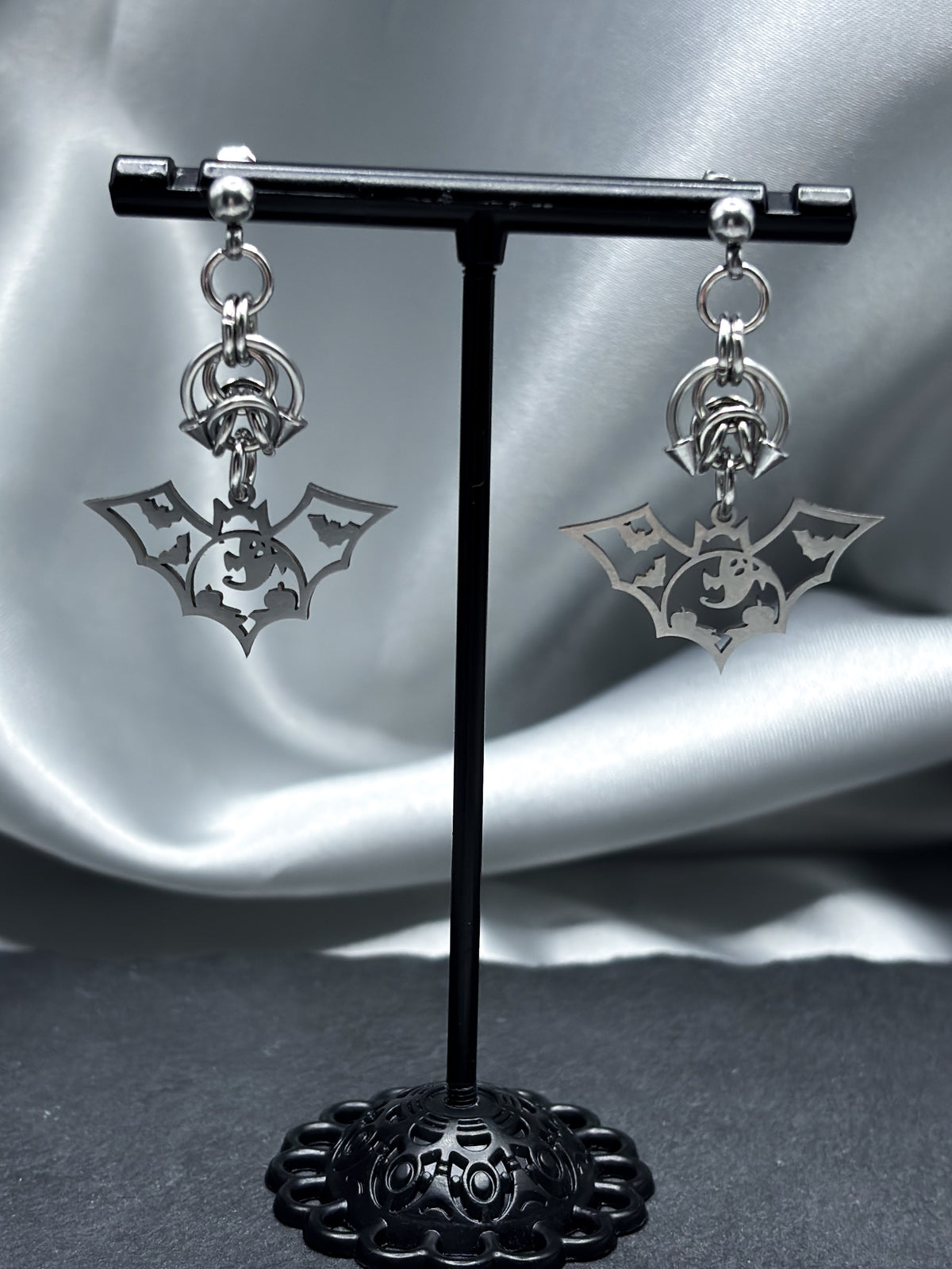 HOLLOW BAT EARRINGS