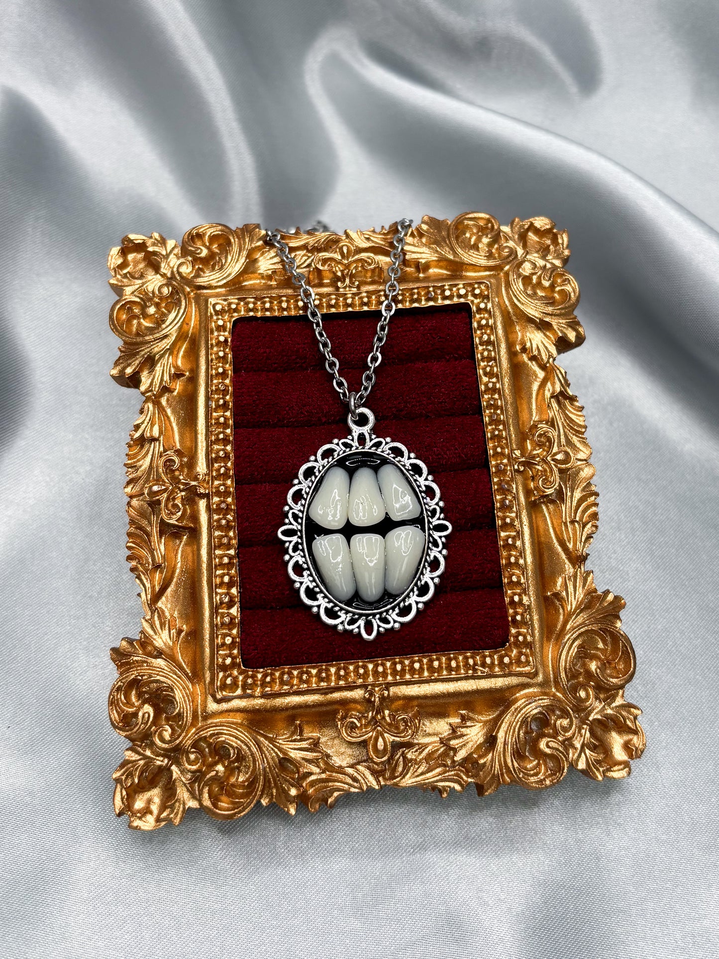 GRINDING TEETH NECKLACE