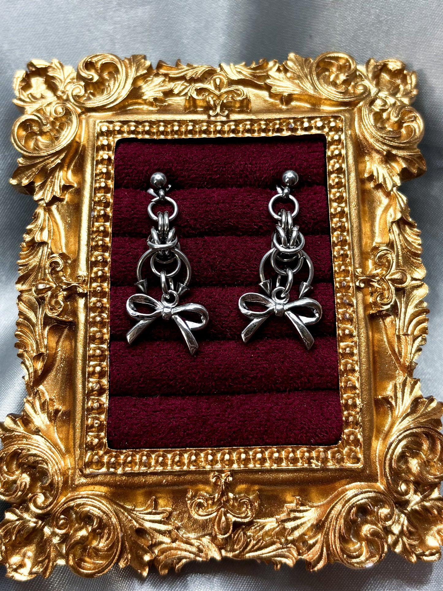 CHAINED BOW EARRINGS