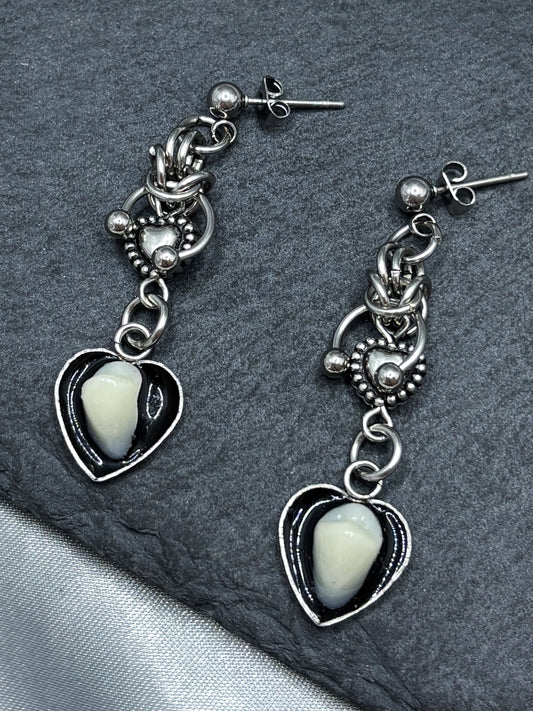 HEARTS ON HEARTS TOOTH EARRINGS