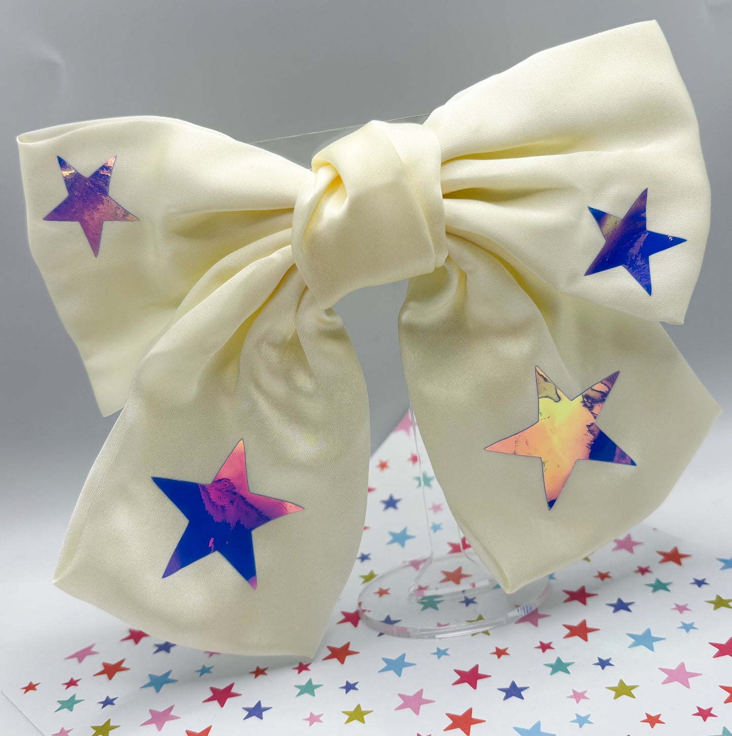 Ivory Bow with Iridescent Stars