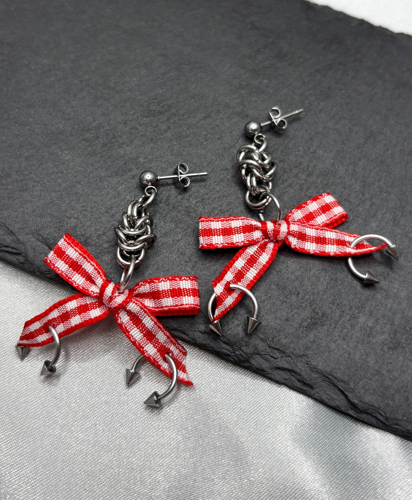 PIERCED BOW EARRINGS