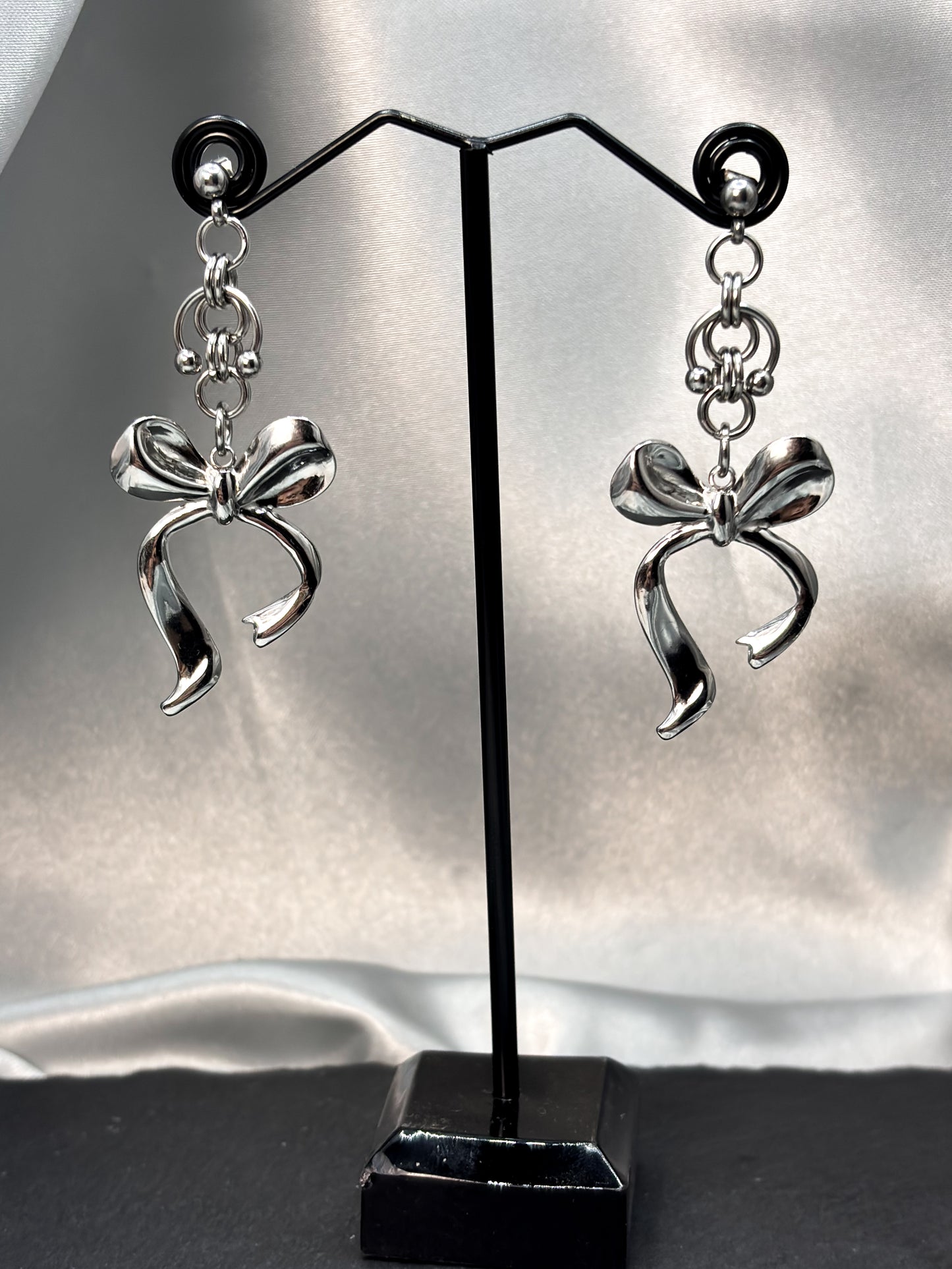SILVER BOW EARRINGS