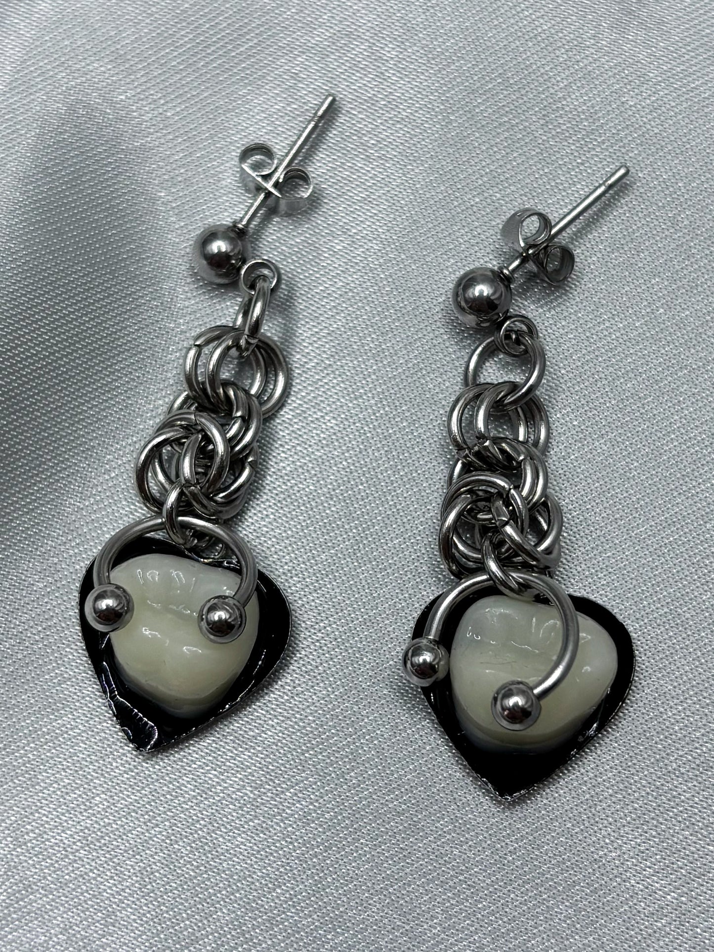 PIERCED HEART TOOTH EARRINGS